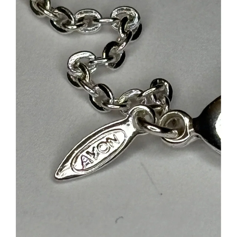 Avon silver tone
